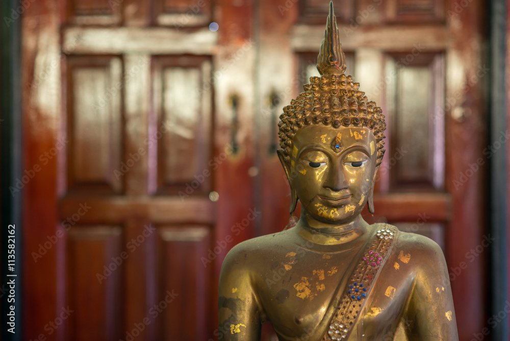 Fototapeta premium Brass statue of Buddha