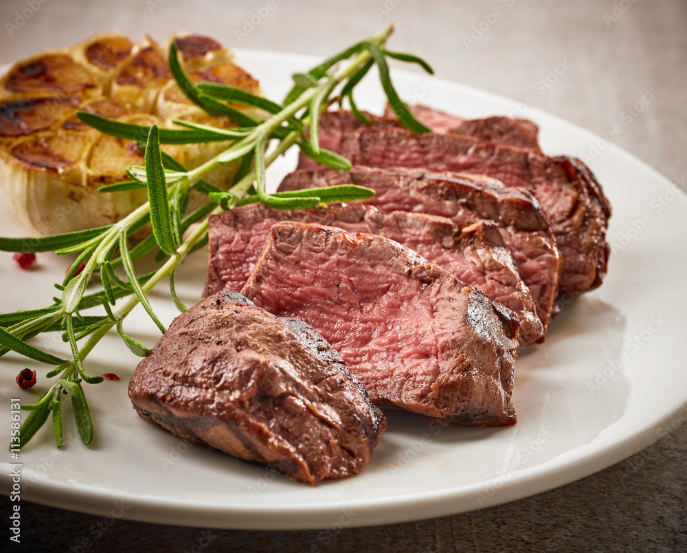 grilled steak on white plate