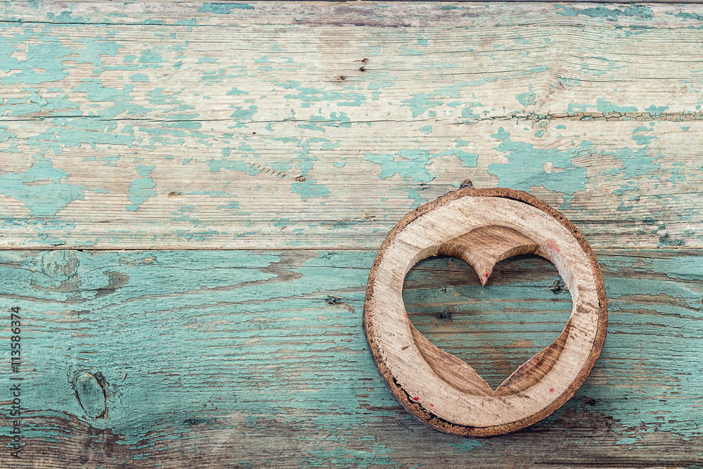 Heart shape carved in wood cut on the old turquoise boards. Heart shape carved in wood cut on the old turquoise boards.