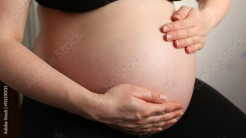 Wallpaper Mural A Pregnant Woman Stroking Belly Torontodigital.ca