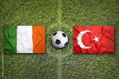 Ireland vs. Turkey flags on soccer field