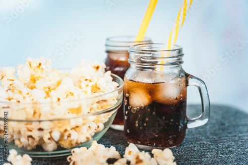 misted bottles of Cola with ice and fresh kettle corn