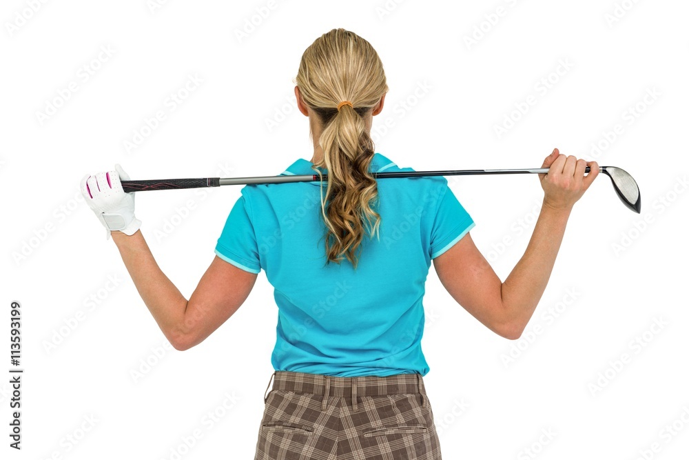 Rear view of golf player holding a golf club Rear view of golf player holding a golf club