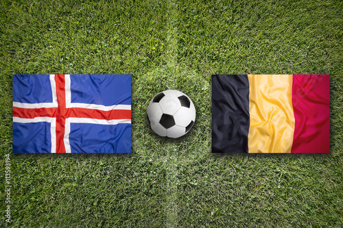 Iceland vs. Belgium flags on soccer field