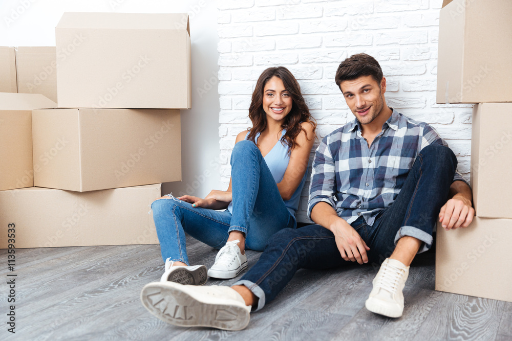 Young couple moving to new flat Young couple moving to new flat