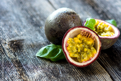Delicious passion fruit on wooden background