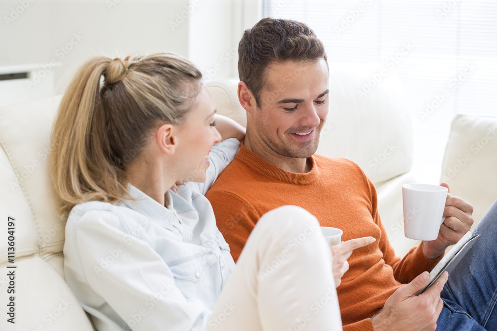 Couple Using Digital Tablet Couple Using Digital Tablet