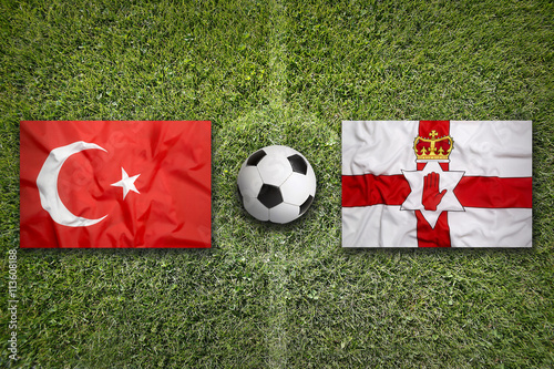 Turkey vs. Northern Ireland flags on soccer field