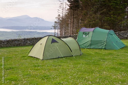 Two tents at dawn with view over the Snowdonia mountains Wales, UK.