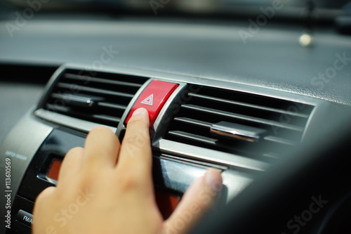 man push turning light signal in the car