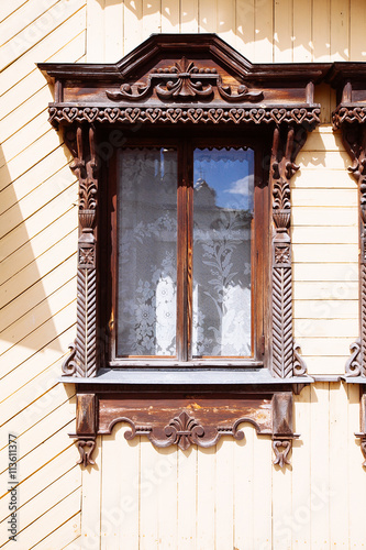 facade of the old Russian log houses in Suzdal