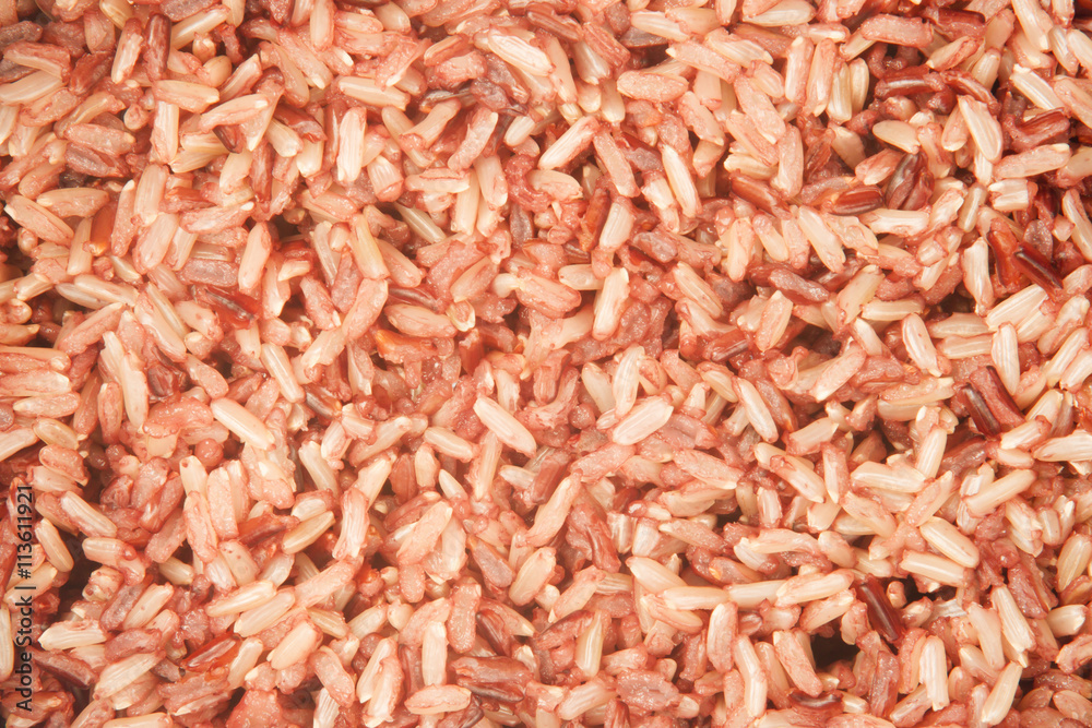 Close up brown rice in rice cooker, healthy eating background concept. top view Close up brown rice in rice cooker, healthy eating background concept. top view