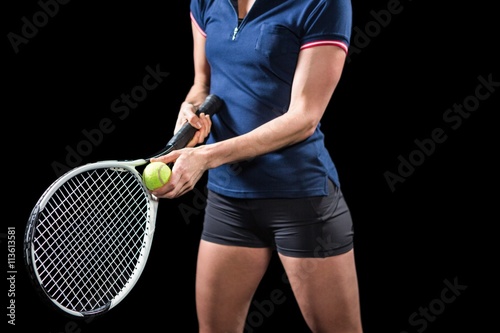 Tennis player holding a racquet ready to serve  © WavebreakmediaMicro