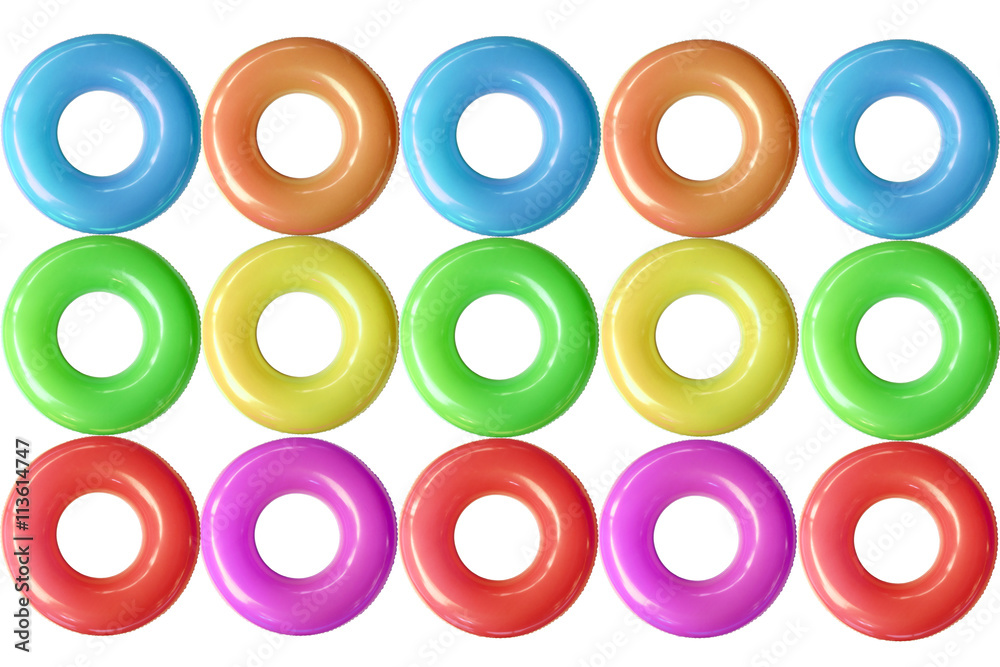 Group of colorful swim rings was derived from the inner tube, the inner, enclosed, inflatable part of older vehicle tires. Group of colorful swim rings was derived from the inner tube, the inner, enclosed, inflatable part of older vehicle tires.