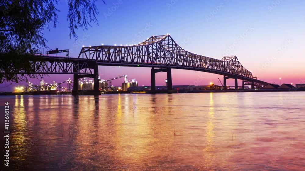 Horace Wilkinson Bridge crosses over the Mississippi River at night in Baton Rouge, Louisiana, timelapse