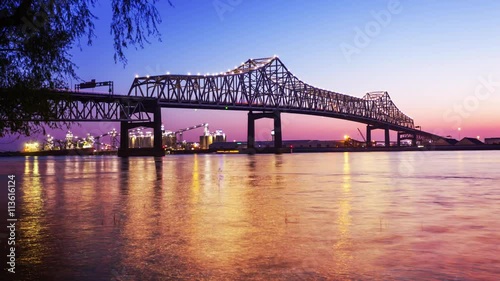 Horace Wilkinson Bridge crosses over the Mississippi River at night in Baton Rouge, Louisiana, timelapse photo