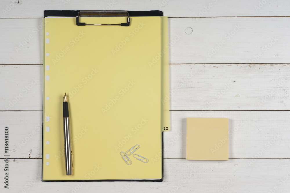 Business blank, notepad, coffee cup and pen at office desk table top view. Corporate stationery branding mock-up Business blank, notepad, coffee cup and pen at office desk table top view. Corporate stationery branding mock-up