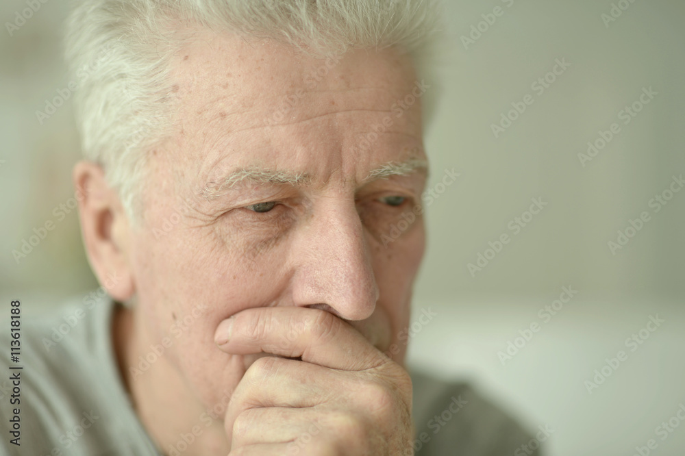 Sad senior man at home Sad senior man at home