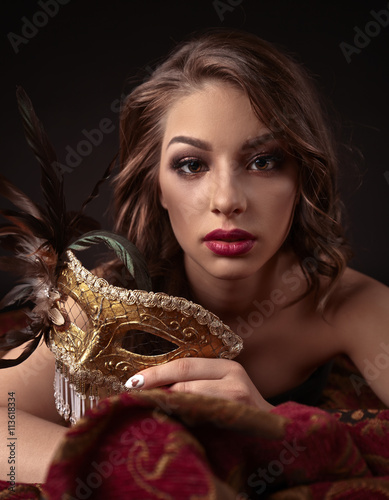 Beautiful woman with carnival mask