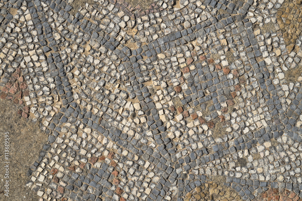 Antique Roman mosaic with sea life motifs located at the archaeological site of Milreu, in Estoi, Algarve, Portugal Antique Roman mosaic with sea life motifs located at the archaeological site of Milreu, in Estoi, Algarve, Portugal