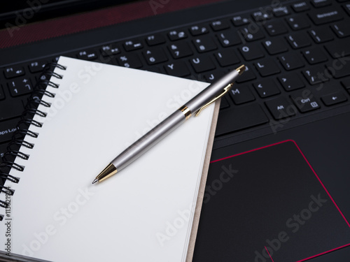 Wallpaper Mural Blank notebook on laptop keyboard 5 Torontodigital.ca