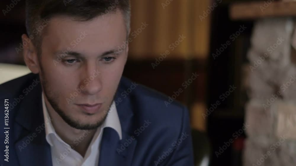 Close up of businessman sitting and working Close up of businessman sitting and working
