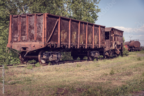 Old open wagon and hopper car