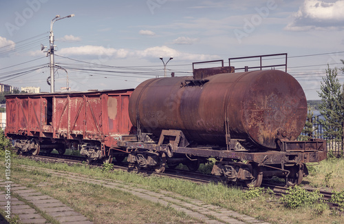 Old covered goods wagon and tank car