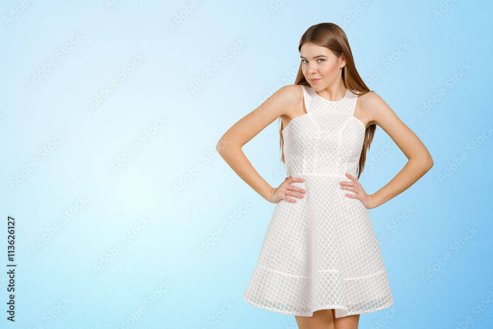 Naklejka premium Smart blond lady wearing white dress