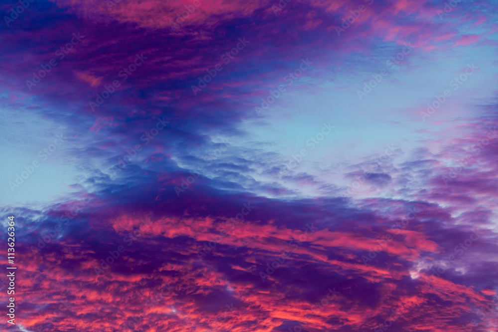 Colorful vibrant clouds on sky at sunset