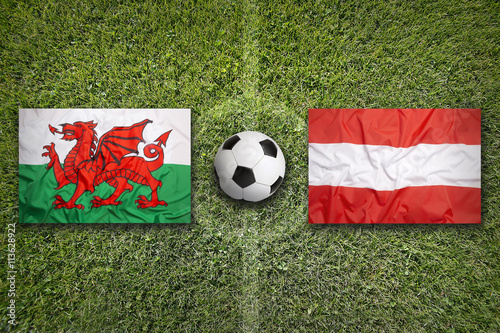 Wales vs. Austria flags on soccer field