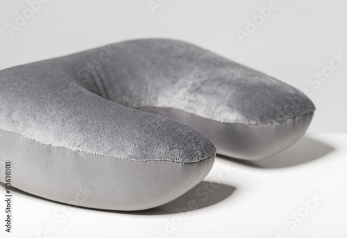 travel cervical pillow isolated on a white background photo