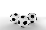 three classic soccer ball or football on white background, 3D rendering or 3D illustration
