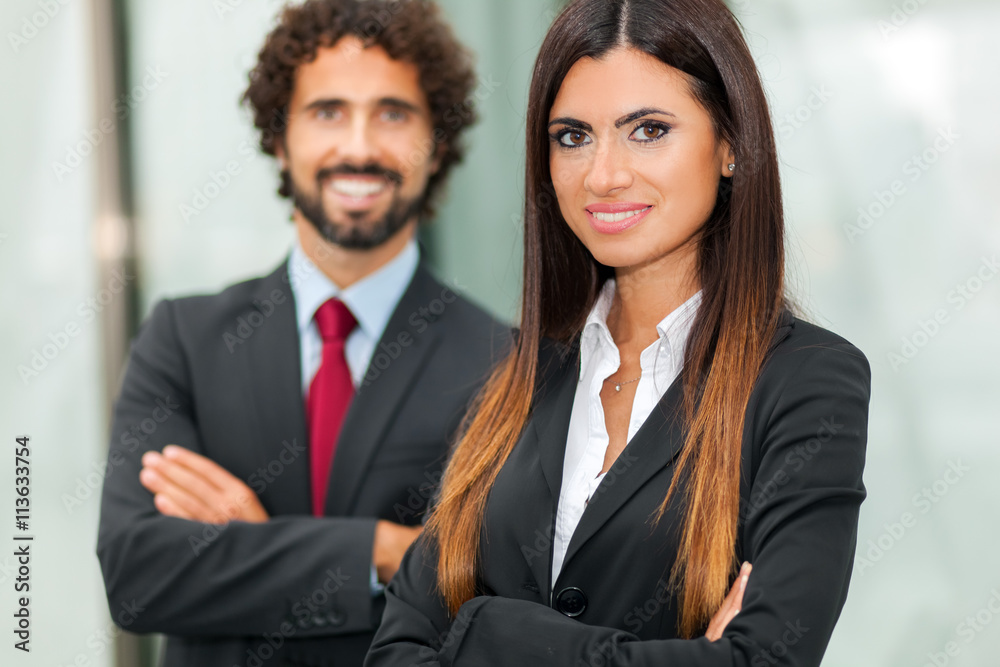 Portrait of two smiling business persons Portrait of two smiling business persons