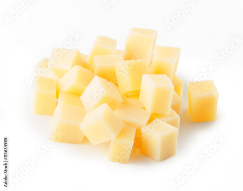 Parmesan cheese cubes on a white background with clipping path.