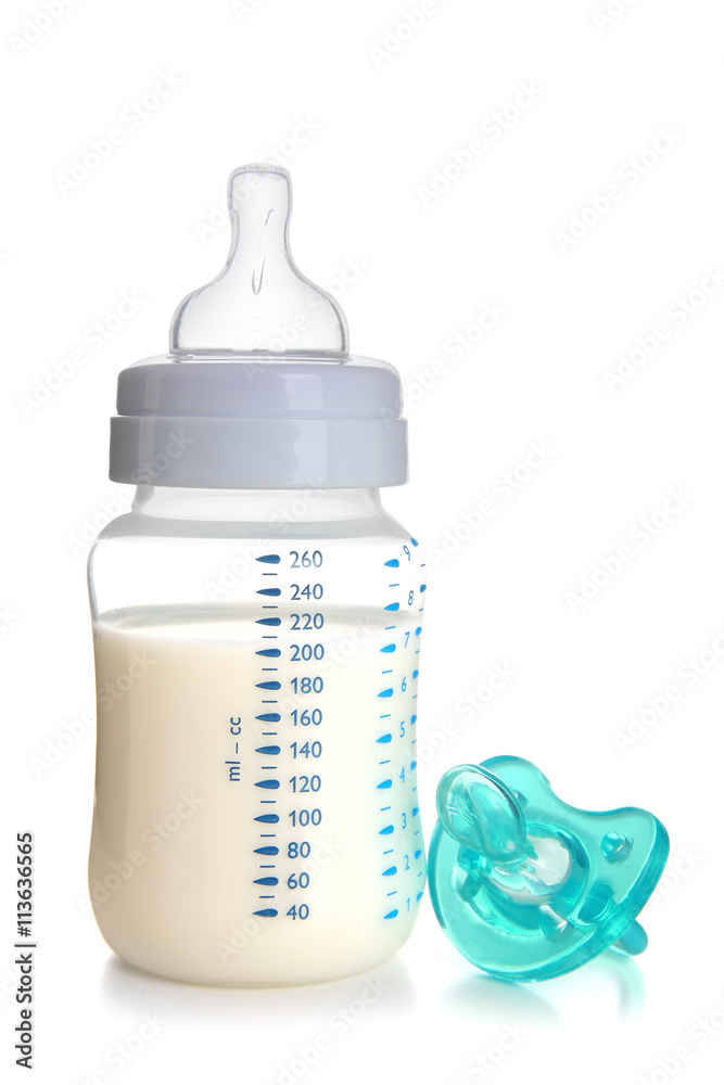Baby milk bottle with pacifier, isolated on white Baby milk bottle with pacifier, isolated on white