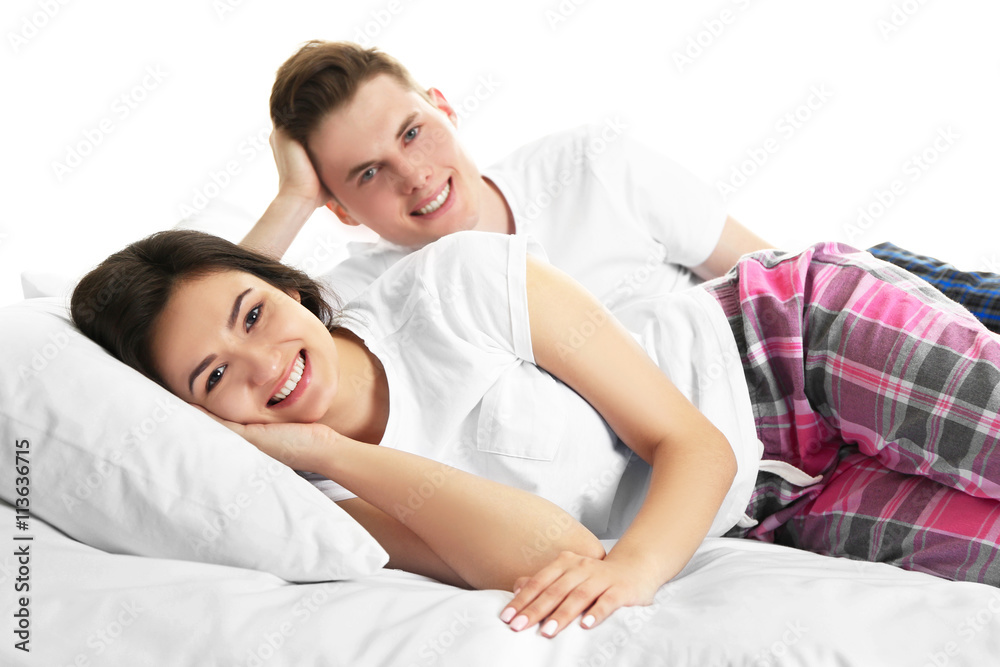 Couple in bed, isolated on white Couple in bed, isolated on white