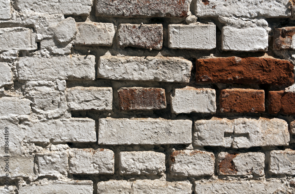 Fototapeta premium Old damaged brick wall texture.