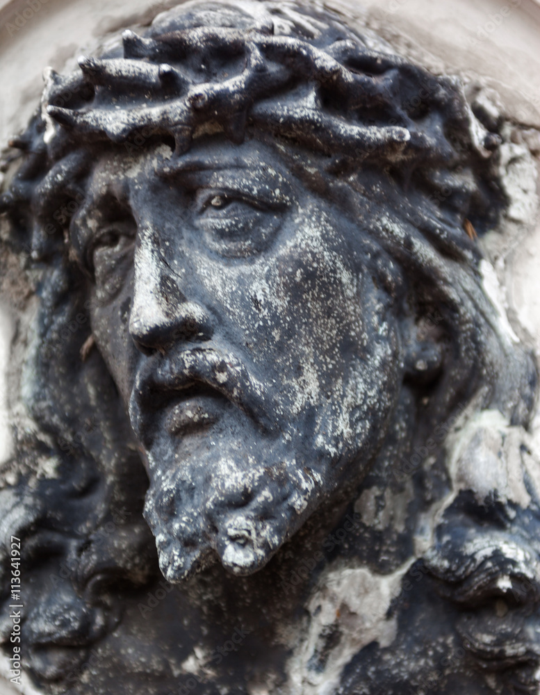Old cemetery marble sculpture of Jesus Christ