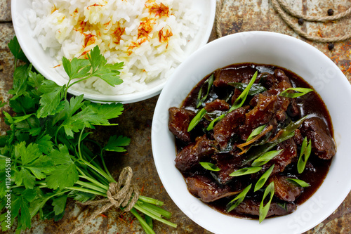 Mongolian meat - beef stewed in sauce with spices in asian style
