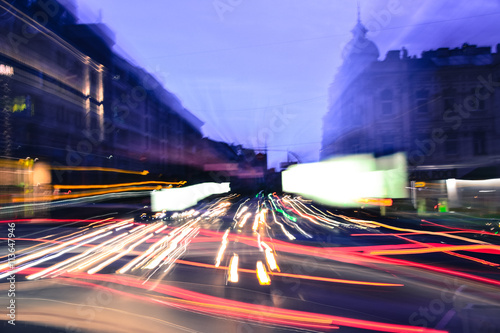 Evening city traffic lights speed blurred motion