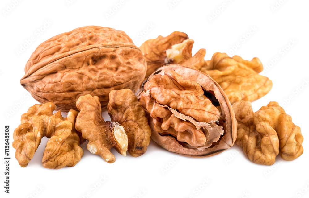 Nuts on white. Whole and shelled walnuts isolated on white background. Nuts on white. Whole and shelled walnuts isolated on white background.