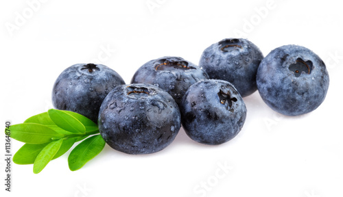 Blueberries with leaf isolated on white.