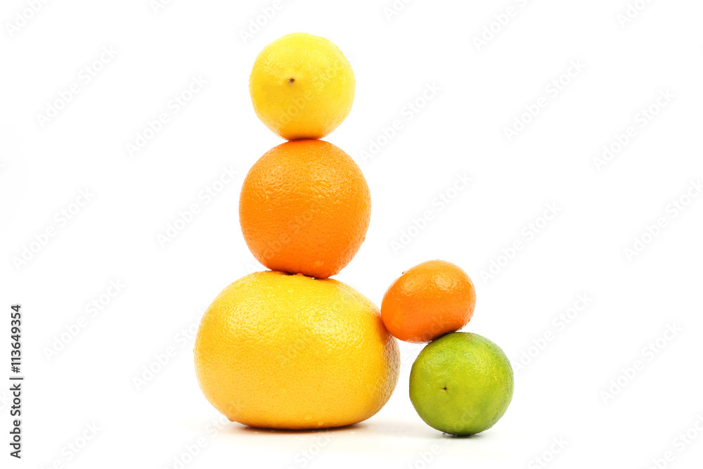 exposed pyramid of citrus fruits on white background exposed pyramid of citrus fruits on white background