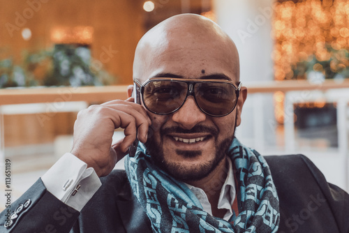 Arab businessman talking on mobile phone