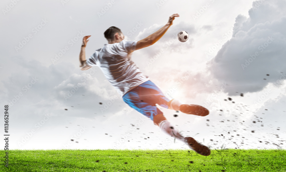 Soccer player hitting ball Soccer player hitting ball
