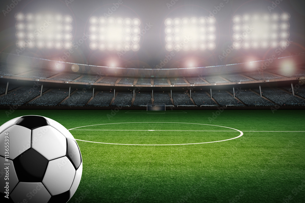 Naklejka soccer ball with soccer stadium background
