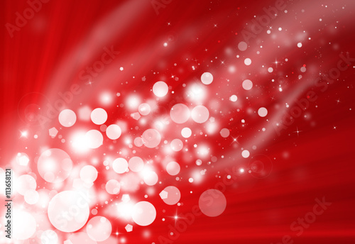 Red glitter sparkle defocused rays lights bokeh beautiful abstract background.