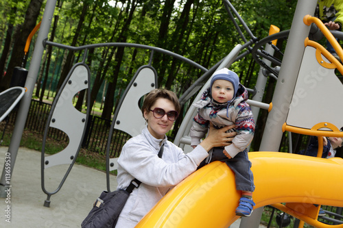 Mother with her son at playground