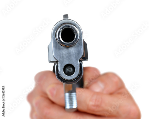 Hand holding gun isolated on white background